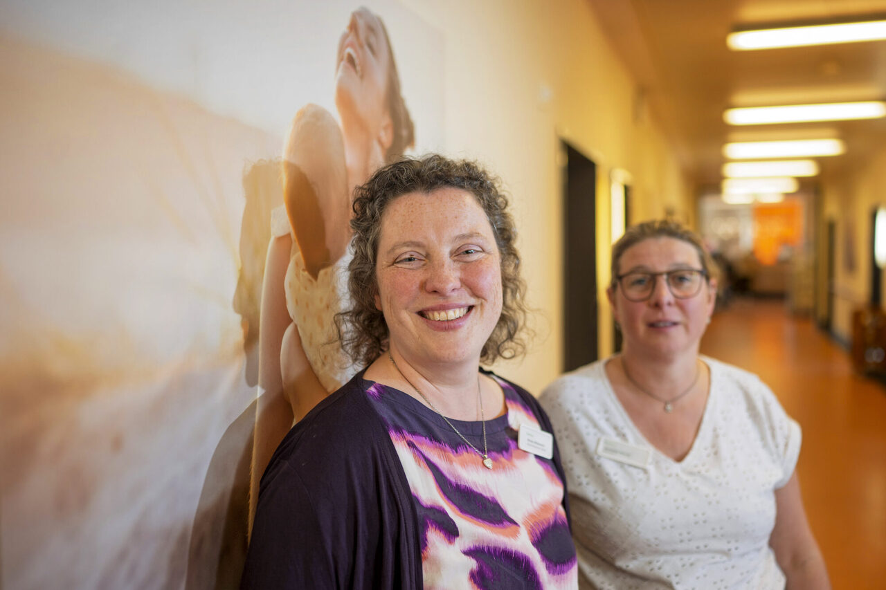 Babynavigatorinnen - zwei Frauen lächeln in die Kamera