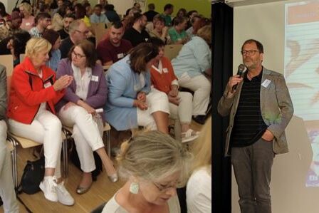 Dr. Schneider und ein diskutierendes Publikum