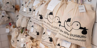 Frühe Hilfen - Beutel mit Babykleidung